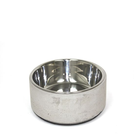 Stainless steel bowl on concrete base Image NaN