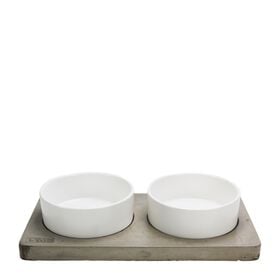 Porcelain bowls on concrete slab