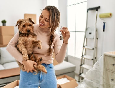 dog with a woman holding keys